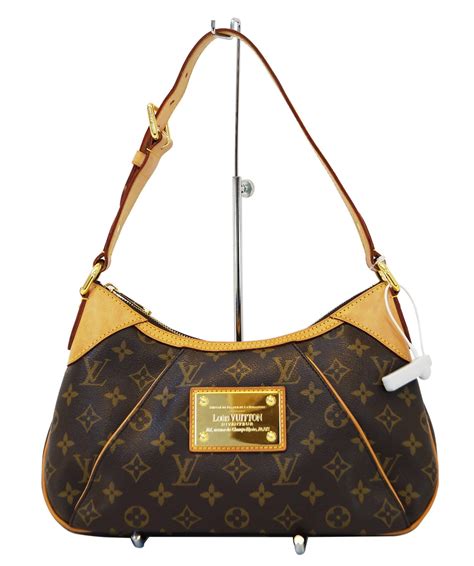 louis vuitton shoulder bag with feet|More.